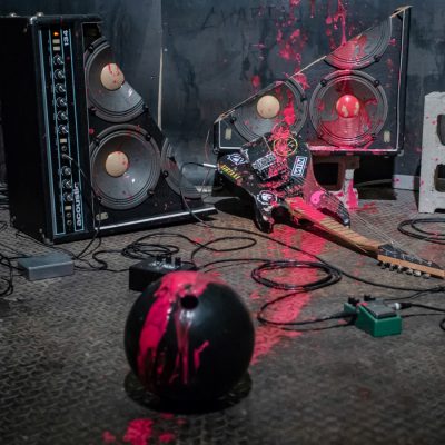 Persistent Teenage Gestures. Mixed-media installation. 2018. ~180cm x 220cm x 160cm. Electric guitar, amplifier, bowling ball, guitar pedals, electronics, pink paint. Photo by Emily Gan.