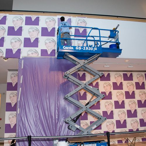 Installation of Warhol self-portrait wallpaper at Andy Warhol The Last Decade, The Baltimore Museum of Art, 2008. © The Baltimore Museum of Art